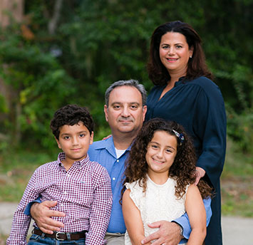 Michael with his wife and two children.